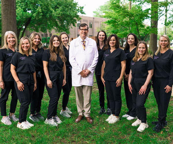 Dr. Glenn Lyle MD and his staff outside